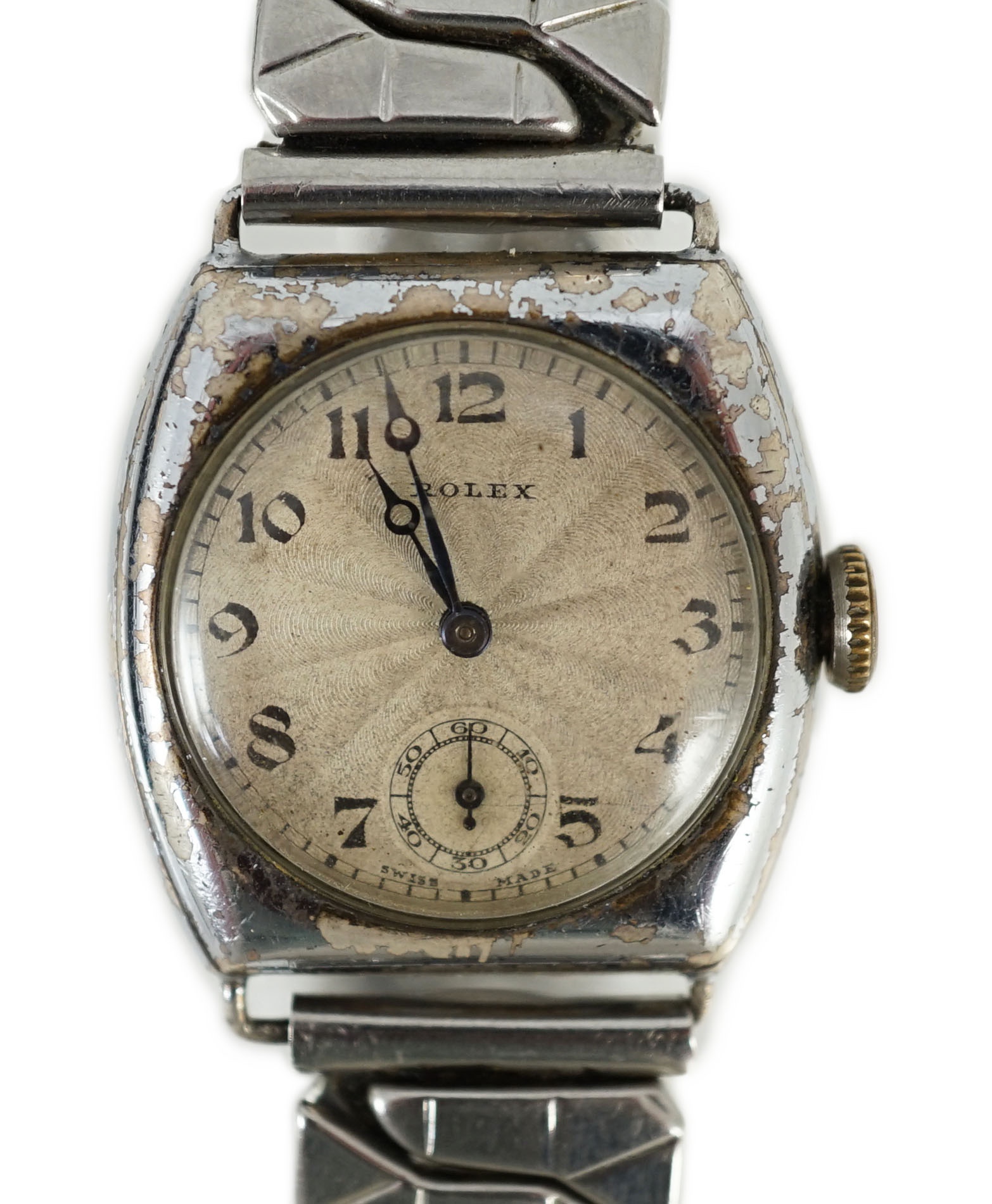 A gentleman's late 1920's silver cushion cased Rolex manual wind wrist watch
